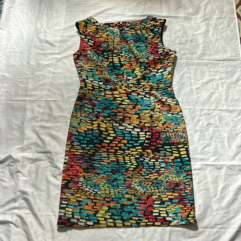 Size 12 Ellen Tracy dress in good condition. Pleated in the front.